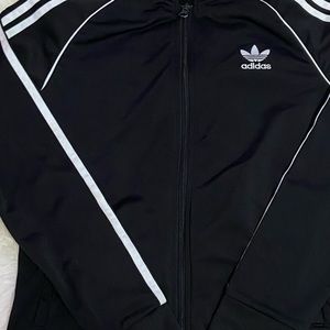 Adidas’s kids black and white track sweatshirt